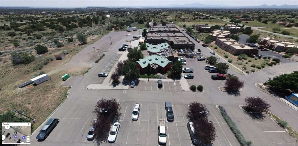 aerial view of shopping plaza parking lot
